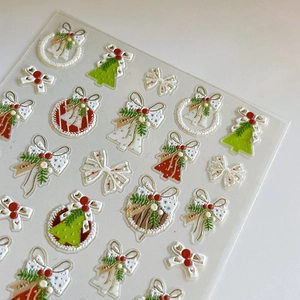 3D embossed Christmas nail stickers featuring festive wreaths, bells and holiday trees