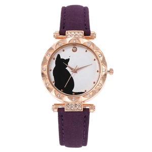 Detail of rose gold rhinestone bezel and purple leather strap on a cat dial watch
