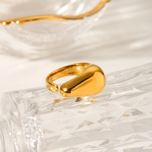 Minimalist gold teardrop open ring with a polished metallic finish and adjustable design