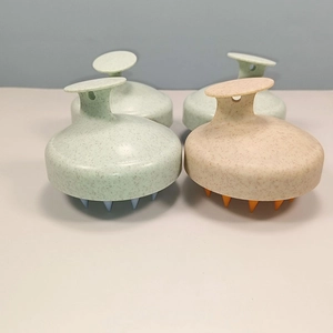 Detail of eco-friendly wheat straw hair brushes with soft silicone bristles and handle