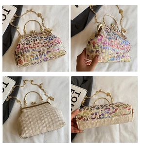 Detailed views of the colorful leopard print woven clutch with gold metal ring handles
