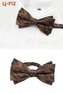 Detail of blue and bronze leopard pattern pre-tied bow tie with adjustable neck strap