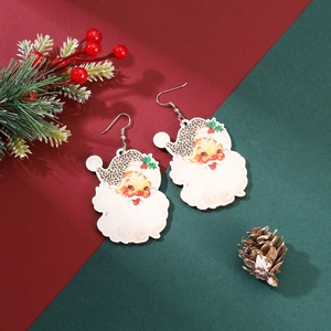 Detailed close-up of handmade cartoon Santa Claus acrylic drop earrings with leopard trim