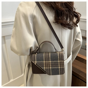 Vintage British plaid crossbody bag with asymmetrical flap and gold metal trim