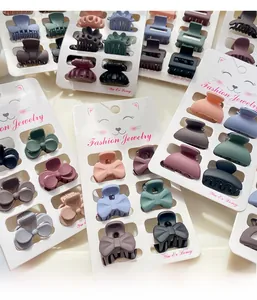 Close-up of assorted macaron matte hair clips on cards for women and girls