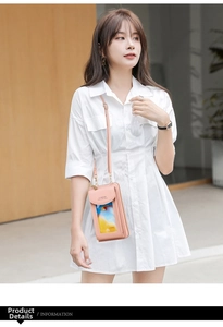 Detail of light pink crossbody phone bag with transparent touch screen window and strap