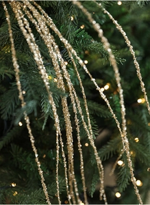 Macro-opname van 90cm gouden pailletten tak voor kerstboom bloemdecoratie