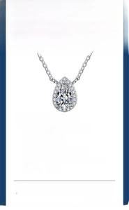 Detail of pear cut moissanite pendant in S925 silver showing 1ct and 2ct size dimensions
