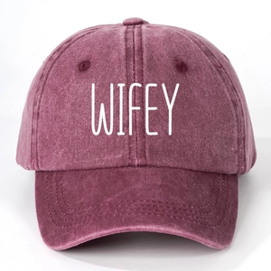 Detailed view of WIFEY print on vintage washed burgundy cotton baseball cap