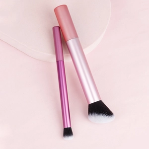 Detail of soft dual-tone synthetic bristles and rose gold matte makeup brush handles