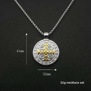 Detailed view of Saint Benedict medal with dimensions 41mm by 32mm and 32g weight