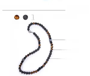 Detail view of 8mm tiger eye and lava stone beads with square hematite accents