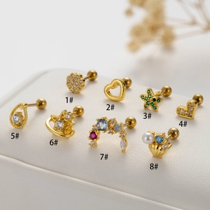 Gold stainless steel cartilage earrings collection featuring zircon hearts and stars