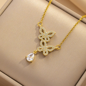 Elegant gold titanium steel butterfly necklace with zircon stones and teardrop pendant