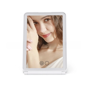 Detail of slim LED travel makeup mirror with touch sensor and adjustable brightness
