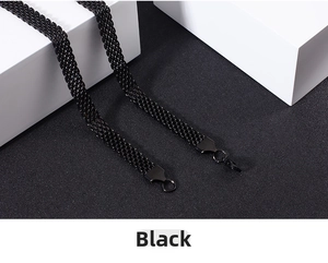 Close-up of black stainless steel mesh chain with lobster clasp and round ring connector
