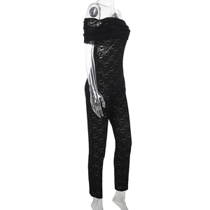 Side view of black lace off-the-shoulder jumpsuit with intricate sheer floral patterns