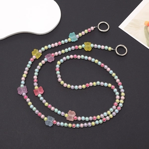Colorful beaded acrylic phone crossbody chain with butterfly charms and metal rings