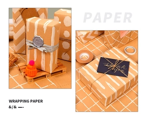 Detail of kraft paper gift wrap featuring white geometric dot and stripe patterns