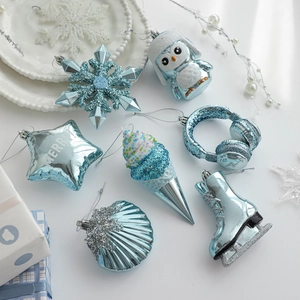 Blue and silver Christmas ornaments set with snowflake and star shapes for tree decor