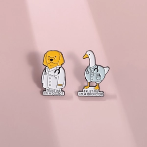Cute enamel pins featuring duck and dog doctors with Trust Me I am a Dogtor/Ducktor text