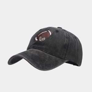 Detail of washed cotton baseball cap featuring rugby and leopard heart print