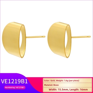 Detailed view of golden brass U-shaped stud earrings showing 15.5mm size and polished finish