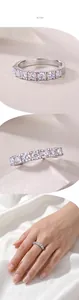 Three views of S925 sterling silver half eternity ring with 7 round moissanite stones