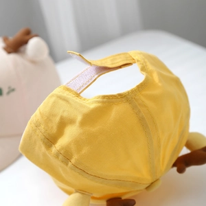 Bright yellow giraffe baseball cap for kids with cute antlers and adjustable strap back