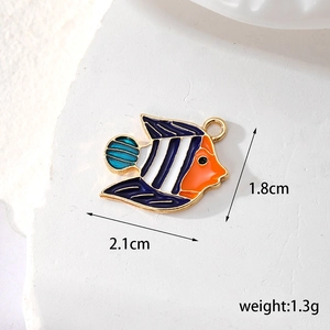 Detail showing tropical fish enamel charm dimensions 2.1x1.8cm and 1.3g weight