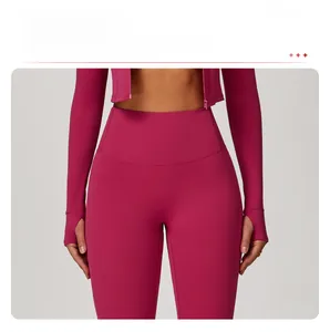 Detail showing the seamless crotch design and high waist of dark pink yoga leggings