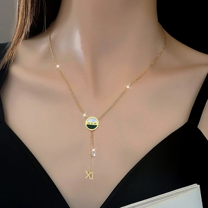 Titanium steel gold necklace with Roman numeral dial pendant and XI tassel charm