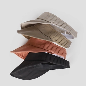 Detailed view of foldable sun visors in four colors with pleated texture headbands