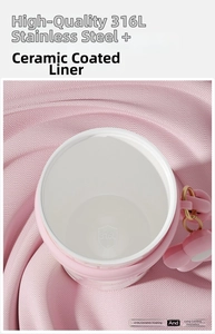 Top view of pink tumbler showing 316L stainless steel interior with white ceramic coating