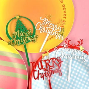 Christmas cake toppers set featuring acrylic reindeer and Merry Christmas designs