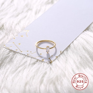 Minimalist S925 sterling silver ring in gold finish with rectangular baguette zircon