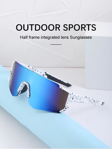 Detail of blue mirrored integrated lens and splattered ink texture on sports sunglasses