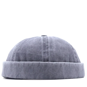 Minimalist grey washed cotton docker hat with a vintage dome design and thickened brim