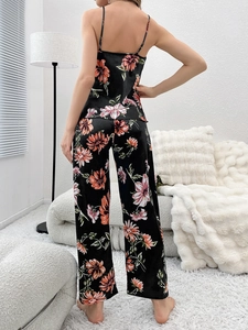 Back view of floral satin loungewear set with camisole top and wide-leg pants