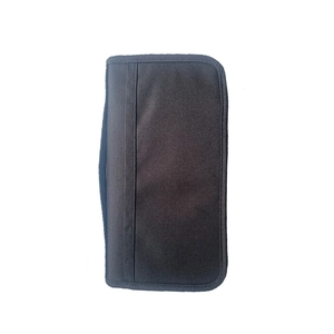 Detail of a black nylon travel organizer pouch with a side handle and durable zipper