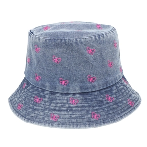 Blue denim bucket hat featuring pink butterfly embroidery for casual summer style.