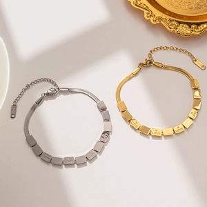 Golden and silver square link bracelets with Love engraving and 18KGP stamp detailing