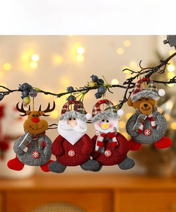 Set of four plush Christmas ornaments featuring reindeer, Santa, snowman and bear icons