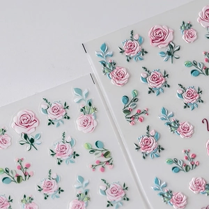 Matte floral nail art stickers with 3D embossed rose designs for professional manicures