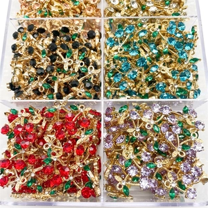 Colorful cherry pendants with cubic zirconia for DIY jewelry making in a storage box