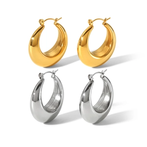 Detailed comparison of hollow gold and silver drop earrings in stainless steel