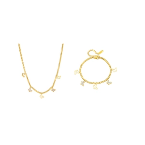 Detail of gold butterfly necklace and bracelet set with white shell inlay pendants