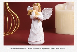 Detail of white resin angel statue with wood texture holding a dog for home decor
