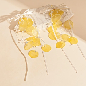 Elegant long yellow shell-style earrings with white ribbon bow and pearls