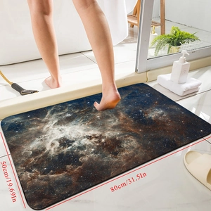 Detailed view of the 80x50cm non-slip bathroom mat with starry nebula print design
